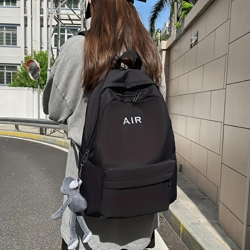 School backpack in a solid color, simple preppy style