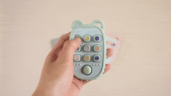 Gryzak silikonowy w kształcie telefonu, gryzak w dłoni